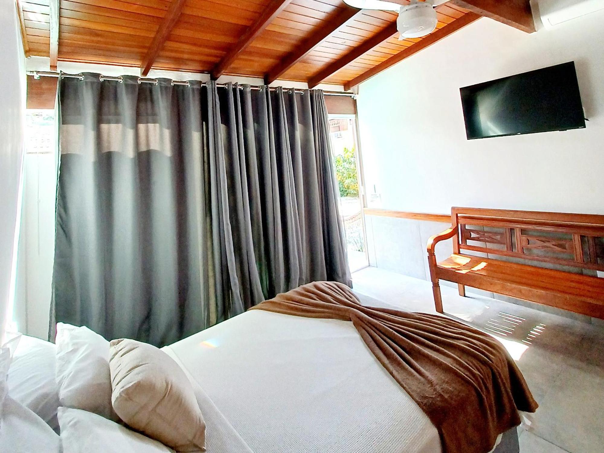Suítes Estou de Férias Paraty Quarto foto
